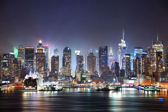 Города