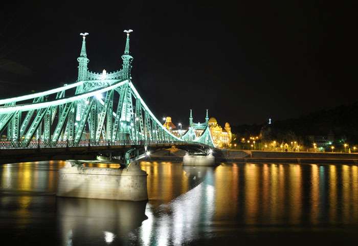 Города