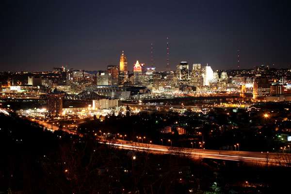 Города